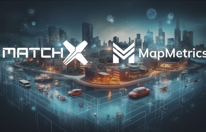 Ciudad IoT nocturna con líneas de conexión digital que enlazan vehículos y edificios.
