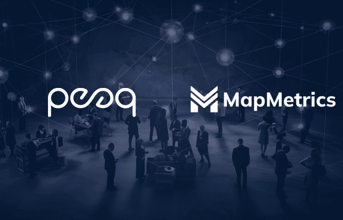 An engaged group of individuals passionately discuss the intersection of blockchain technology, data connectivity, and the integration of the DePIN projects peaq and MapMetrics.