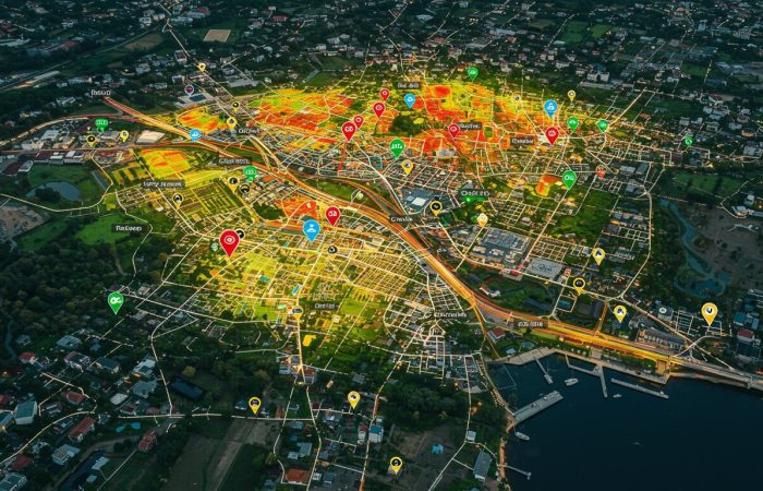 Urban heat maps displaying temperature variations across different city areas, with color gradients indicating heat intensity.